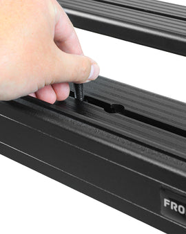 This 1358mm/53.5'' long full-size Slimline II cargo carrying roof rack kit for the Toyota Hilux (1988-1997) contains Slimline II Tray and Wind Deflector, as well as 4 Gutter Mount legs for mounting the Tray to the vehicle. This taller kit has space for mounting the Front Runner tables or other compatible accessories under the rack. Installs easily with no drilling required.