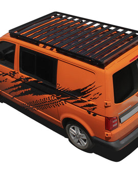 This 2570mm/101.2'' long full-size Slimline II cargo roof rack kit contains the Slimline II Tray, Wind Deflector and 2 Foot Rails to mount the Slimline II Tray to your Volkswagen T5/T6 Transporter SWB. It easily installs using the existing factory mounting points. No drilling required.