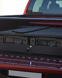 Storing, organizing, and moving gear in Ford Ranger T6s just got easier.This Wolf Pack based lockable drawer system provides a comprehensive and practical vehicle based storage solution. The removable Wolf Pack boxes simplify the organizing and transporting of stored items between the vehicle and the campsite, garage, store, etc. Designed specifically to fit the contours of the Ford Ranger T6. Engineered tough for both on and off-road conditions.