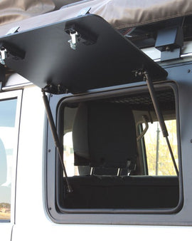 ​The Front Runner Aluminium Gullwing Window replaces the stock LEFT HAND rear window with an upward/outward opening window that is hinged at the top. Create easy access to the rear storage area of your Toyota Land Cruiser 76. 