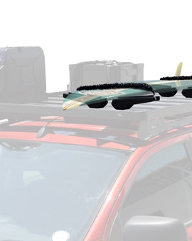 For use with most Surfboards, SUP boards, Wind Surf and Kite Boards. Specially designed to keep your boards safe and secure during transport on the world’s toughest roads. Features variable width adjustment, padded board protection and universal water sport board compatibility.