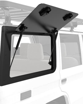 ​The Front Runner Aluminium Gullwing window replaces the stock RIGHT HAND rear window with an upward/outward opening window that is hinged at the top. Create easy access to the rear storage area of your Toyota Land Cruiser 76. 