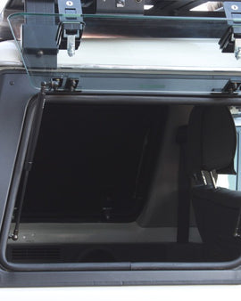 ​The Front Runner Glass Gullwing Window replaces the stock RIGHT HAND rear window with an upward/outward opening window that is hinged at the top. Create easy access to the rear storage area of your Toyota Land Cruiser 76. 