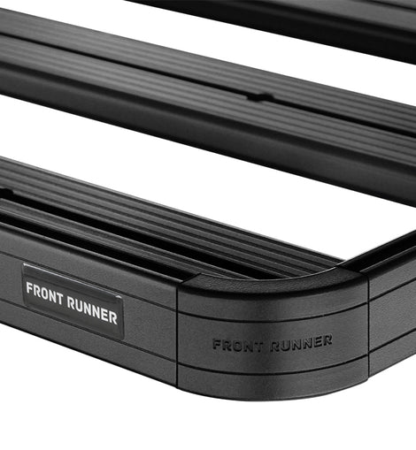 This 1358mm/53.5'' long 1/2 size Slimline II cargo carrying roof rack kit for the Land Rover Defender contains Slimline II Tray and Wind Deflector, as well as 6 Gutter Mount legs for mounting the Tray to the vehicle. This taller kit has space for mounting the Front Runner Camp Tables or other compatible accessories under the rack. Installs easily with no drilling required.