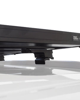 This 1156mm/45.5'' long full-size Slimline II cargo roof rack kit contains the Slimline II Tray, Wind Deflector and 3 pairs of Rail Grip Feet to mount the Slimline II Tray to the roof rails of your Kia Sedona (YP). This system installs easily with off-road tough feet that grip onto the existing factory/OEM roof rails. No drilling required.