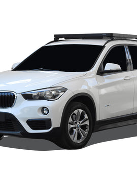 Free up precious cargo space in your BMW X1 by using this Slimline II Roof Rail Rack Kit to transport your favorite adventure gear so you can always have room for your travel companions.