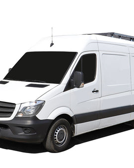 This 2312mm/91'' long, 1/2 Slimline II cargo carrying roof rack kit for the Dodge Sprinter (2007+) contains 2 Slimline II Trays, Wind Deflector, Track Set and 12 Mounting Feet. Drilling is required for installation.