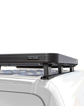 This 1560mm/61.4'' long, Slimline II cargo carrying roof rack kit for the Dodge Sprinter (2007+) contains a Slimline II Tray, Wind Deflector, Track Set and 6 Mounting Feet. Drilling is required for installation.