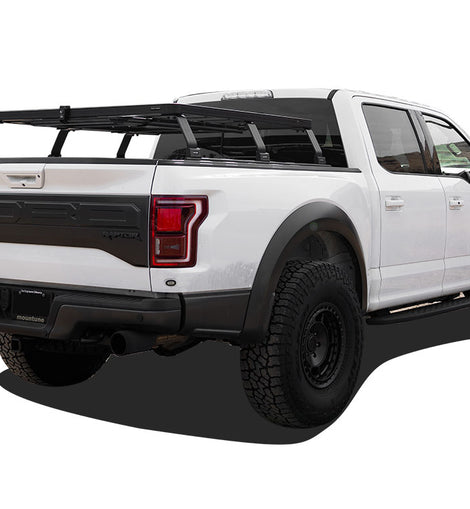 This kit creates a full-size rack that sits above your Ford F150’s (2015 +) 6.5' load bed with roll top. This Slimline II cargo carrying rack kit contains the Slimline II tray (1475mm x 1560mm) and 6 Pickup Truck Bed Universal Legs that fit into the existing roll top rails.