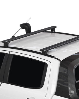A set of Load Bars with Track Mounted Feet used to transport gear on the roof of your vehicle when theres no need for a full Front Runner Roof Rack. This low profile, smaller footprint solution includes 2 50mm Feet, 2 60mm Feet, 2 1255mm Load Bars, 2 Ford Ranger 1200mm Tracks, 1 10mm Roof Load Bar Wind Deflector and fitting instructions - all the components necessary to mount the Front Runner Load Bars to the vehicle. 