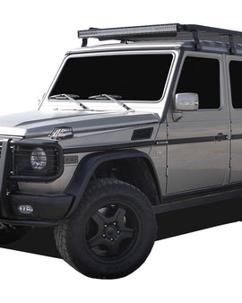 This 2166mm/85.3'' long full-size Slimline II cargo carrying roof rack kit for the Mercedes Gelandewagen G Class contains Slimline II Tray and Wind Deflector, as well as 8 Gutter Mount legs for mounting the Tray to the vehicle. This taller kit has space for mounting the Front Runner tables or other compatible accessories under the rack. It installs easily with no drilling required. 