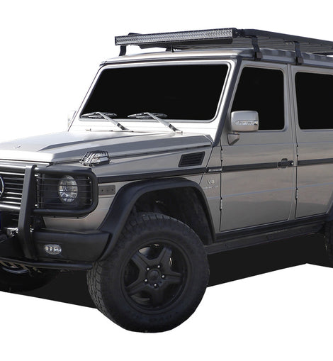 This 2166mm/85.3'' long full-size Slimline II cargo carrying roof rack kit for the Mercedes Gelandewagen G Class contains Slimline II Tray and Wind Deflector, as well as 8 Gutter Mount legs for mounting the Tray to the vehicle. This taller kit has space for mounting the Front Runner tables or other compatible accessories under the rack. It installs easily with no drilling required. 