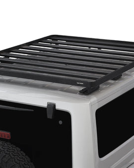 This Slimline II rack kit contains all the components needed to mount the Slimline II cargo carrying rack to a Jeep JK 2 door 2007-2018 including the Slimline II Tray (1425mm x 1762mm), the Jeep Extreme Mounting System and a Wind Deflector. This rugged, sophisticated, high performance, nearly indestructible rack system allows you to quickly remove the Freedom Panels and works with the hardtop roof on or with no roof at all.