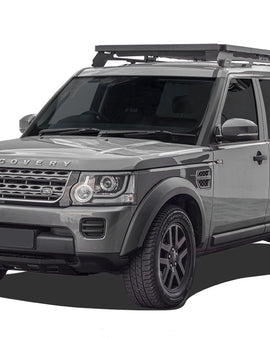 This 2166mm/85.3'' long full-size Slimline II cargo roof rack kit contains the Slimline II Tray, Wind Deflector and 2 Foot Rails to mount the Slimline II Tray to your Land Rover Discovery LR3/LR4. It easily installs using the existing factory mounting points. No drilling required. 