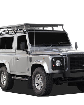 This 1964mm/77.3'' long full-size Slimline II cargo carrying roof rack kit for the Land Rover Defender 90 contains Slimline II Tray and Wind Deflector, as well as 8 Gutter Mount legs for mounting the Tray to the vehicle. This taller kit has space for mounting the Front Runner tables or other compatible accessories under the rack. It installs easily with no drilling required.