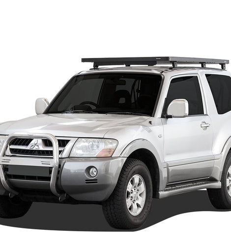 This 1560mm/61.4'' long full-size Slimline II cargo carrying roof rack kit for the Mitsubishi Pajero/Montero CK (3rd Gen) SWB contains Slimline II Tray, Wind Deflector, 2 Tracks and 6 Feet. Drilling is required for installation.