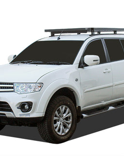 This 1762mm/69.4'' long full-size Slimline II cargo carrying roof rack kit for the Mitsubishi Pajero Sport contains Slimline II Tray, Wind Deflector, 2 Tracks and 6 Feet. This taller kit has space for mounting the Front Runner tables or other compatible accessories under the rack. Drilling may be required for installation.