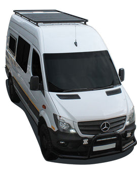 This 2772mm/109'' long full-size Slimline II cargo carrying roof rack kit for the Mercedes Benz Sprinter contains Slimline II Tray, Wind Deflector and 8 Feet. It installs easily to factory mounting points with no drilling required. Fits the ''Tall Roof'' option only. Will not fit the ''Standard/Low Roof''.