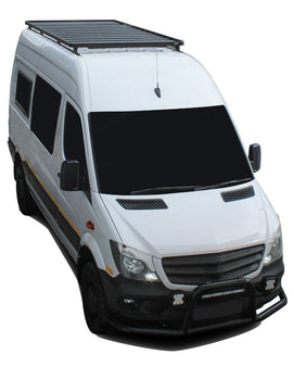 This 2772mm/ 109'' long, full-size, Slimline II cargo carrying roof rack kit for the Volkswagen Crafter w/o OEM Tracks contains Slimline II Tray, Wind Deflector, 2 Tracks and 8 mounting Feet. Drilling is required for installation.