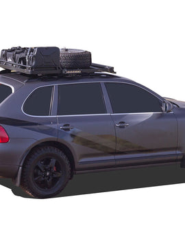 This 1358mm/53.5 long, full-size, Slimline II cargo roof rack kit contains the Slimline II Tray, Wind Deflector and 2 pairs of Grab-On Feet to mount the Slimline II Tray to the roof rails of your Porsche Cayenne (2002-2010). This system installs easily with off-road tough feet that grab on to the existing factory/OEM roof rails. No drilling required.