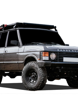 This 1964mm/77.3'' long full-size Slimline II cargo carrying roof rack kit for the Rover Range Rover (1970-1996) contains Slimline II Tray and Wind Deflector, as well as 6 Gutter Mount legs for mounting the Tray to the vehicle. It installs easily with no drilling required.