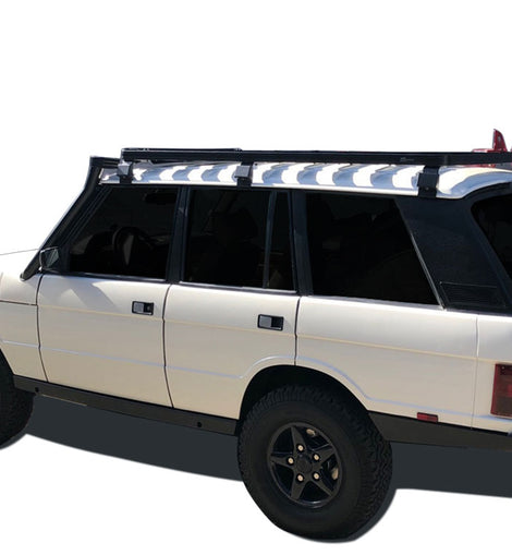 This 1964mm/77.3'' long full-size Slimline II cargo carrying roof rack kit for Range Rover (1970-1996) contains Slimline II Tray and Wind Deflector, as well as 6 Gutter Mount legs for mounting the Tray to the vehicle. This taller kit has space for mounting the Front Runner tables or other compatible accessories under the rack. It installs easily with no drilling required. 