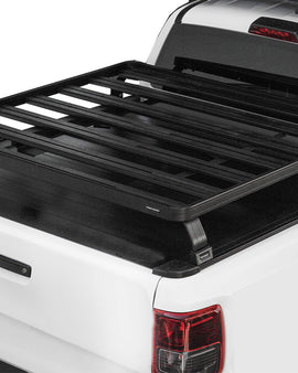 This kit creates a full-size rack that sits above your Pickup Truck's load bed when fitted with a Roll Top Cover. This Slimline II cargo carrying rack kit contains the Slimline II tray (1425mm x 1156mm) and 4 Pickup Roll Top Leg Mounts that fit into the existing factory/OEM tracks in your Roll Top Cover.
