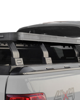 This kit creates a full-size rack that sits above your Ford Ranger Wildtrak's load bed when fitted with a Roll Top Cover. This Slimline II cargo carrying rack kit contains the Slimline II tray (1425mm x 1156mm) and 6 Pickup Roll Top Leg Mounts that fit into the existing factory/OEM tracks in your Roll Top Cover.