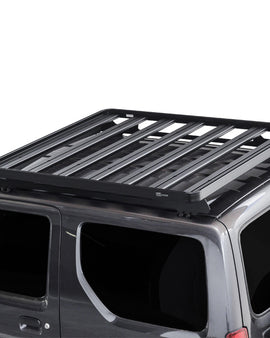 This 1358mm/53.5'' long full-size Slimline II cargo roof rack kit contains the Slimline II Tray, Wind Deflector and 2 Foot Rails to mount the Slimline II Tray to your Suzuki Jimny. It easily installs using the existing factory mounting points. No drilling required.