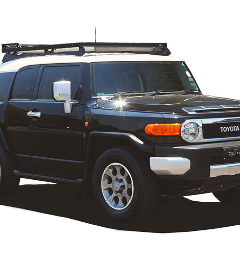 This 1964mm/77.3'' long full-size Slimline II cargo roof rack kit contains the Slimline II Tray, Wind Deflector and 2 Foot Rails to mount the Slimline II Tray to your Toyota FJ Cruiser. It easily installs using the existing factory mounting points. No drilling required.
