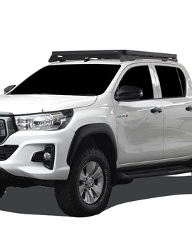 This 1358mm/53.5'' long, full-size, Slimline II cargo roof rack kit contains the Slimline II Tray, Wind Deflector and 2 Low Profile Foot Rails to mount the Slimline II Tray to your Toyota Hilux Revo 2016+. Drilling is required for installation.