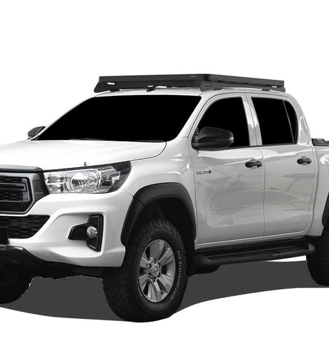 This 1358mm/53.5'' long, full-size, Slimline II cargo roof rack kit contains the Slimline II Tray, Wind Deflector and 2 Low Profile Foot Rails to mount the Slimline II Tray to your Toyota Hilux Revo 2016+. Drilling is required for installation.