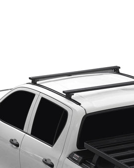A set of Load Bars with Track Mounted Feet used to transport gear on the roof of your vehicle when theres no need for a full Front Runner Roof Rack. This low profile, smaller footprint solution includes 4 40mm-50mm Feet, 2 1165mm Load Bars, 2 Toyota Revo DC (2016-Current) Tracks / 1300mm Tracks, 1 10mm Roof Load Bar Wind Deflector and fitting instructions - all the components necessary to mount the Front Runner Load Bars to the vehicle.