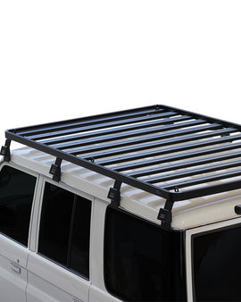 This 2368mm/93.2'' long full-size Slimline II cargo carrying roof rack kit for the Toyota Land Cruiser 76 contains Slimline II Tray and Wind Deflector, as well as 8 Gutter Mount legs for mounting the Tray to the vehicle. It installs easily with no drilling required.