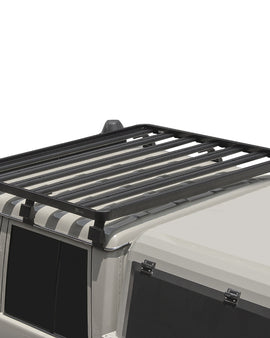 This 1358mm/53.5'' long full-size Slimline II cargo carrying roof rack kit for the Toyota Land Cruiser DC contains Slimline II Tray and Wind Deflector, as well as 6 Gutter Mount legs for mounting the Tray to the vehicle. It installs easily with no drilling required.