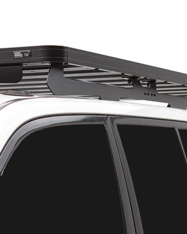 This 1964mm/77.3'' long, full-size, Slimline II cargo roof rack kit contains the Slimline II Tray, Wind Deflector and 2 Foot Rails to mount the Slimline II Tray to your Toyota Land Cruiser 100/Lexus LX470. It easily installs using the existing factory mounting points. No drilling required.