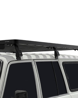 This 2166mm/85.3'' long, full-size, Slimline II cargo carrying roof rack kit for the 60 Series Toyota Land Cruiser contains the Slimline II Tray and Wind Deflector, as well as 6 Gutter Mount Legs for mounting the Tray to the vehicle. This taller kit has space for mounting the Front Runner tables or other compatible accessories under the rack. Installs easily with no drilling required.