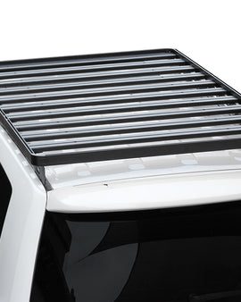 Load up your Land Cruiser with this Slimline II cargo roof rack kit—no drilling required.