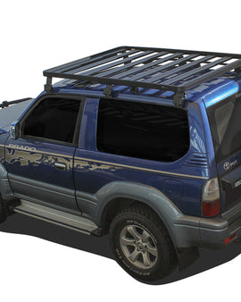 This 1762mm/69.4'' long full-size Slimline II cargo carrying roof rack kit for Toyota Prado 90 contains Slimline II Tray and Wind Deflector, as well as 6 Gutter Mount legs for mounting the Tray to the vehicle.