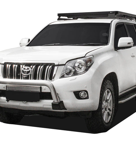 This 1964mm/77.3'' long full-size Slimline II cargo carrying roof rack kit contains a Slimline II Tray, Wind Deflector, and 2 foot rails to mount the Slimline II Tray to your Toyota Prado 150. It easily installs using the existing factory mounting points. No drilling required.