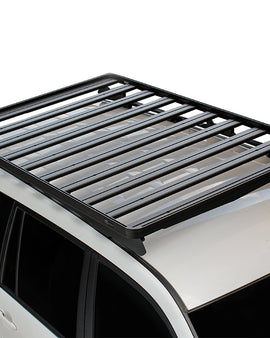 This 1964mm/77.3'' long full-size Slimline II cargo carrying roof rack kit contains a Slimline II Tray, Wind Deflector, and 2 foot rails to mount the Slimline II Tray to your Toyota Prado 120. It easily installs using the existing factory mounting points. No drilling required.