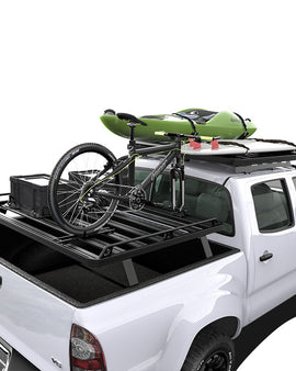 This kit creates a full size rack that sits above your Toyota Tacomas (2005 + w/OEM bed rails) load bed. This Slimline II cargo carrying rack kit contains the Slimline II tray (1425mm/56.1'' (W) x 1358mm/53.5'' (L)) and 4 Pickup Truck Bed Universal Legs that fit into the existing factory/OEM bed tracks. No drilling required. 