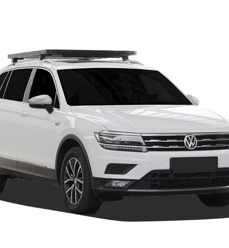 This 1358mm/53.5” long, full-size, Slimline II cargo roof rack kit contains the Slimline II Tray, Wind Deflector and 2 pairs of Grab-On Feet to mount the Slimline II Tray to the roof rails of your Volkswagen Tiguan. This system installs easily with off-road tough feet that grab on to the existing factory/OEM roof rails. No drilling required.