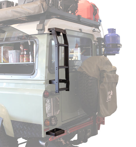 Your Defender deserves a ladder as tough as it is. Gain easy access to the roof for quick loading and unloading of adventure gear using this smart ladder that clamps onto the gutter and bolts to the vehicle body. The bottom rung mounts below the bumper using existing holes.