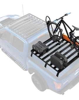 This kit creates a full size rack that sits above your pickup truck bed. This Slimline II cargo carrying rack kit contains the Slimline II tray (1165mm/45.9'' (W) x 1358mm/53.5'' (L)), 2 Tracks, and 4 Pickup Truck Bed Universal Legs that fit into the Tracks.Drilling is required for installation.