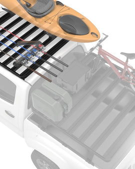 This 1358mm/53.5'' long full-size Slimline II cargo carrying roof rack kit for the Mahindra DC contains Slimline II Tray and Wind Deflector, as well as 4 Gutter Mount legs for mounting the Tray to the vehicle. It installs easily with no drilling required.