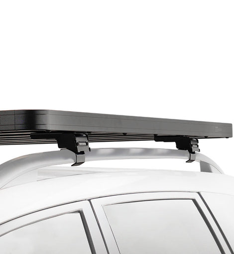 This 1358mm/53.5 long, full-size, Slimline II cargo roof rack kit contains the Slimline II Tray, Wind Deflector and 2 pairs of Grab-On Feet to mount the Slimline II Tray to the roof rails of your Toyota Etios Cross. This system installs easily with off-road tough feet that grab on to the existing factory/OEM roof rails. No drilling required.