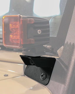 Quickly and easily mount lights to your Jeep JK Wrangler with the Front Runner Windshield spotlight brackets.