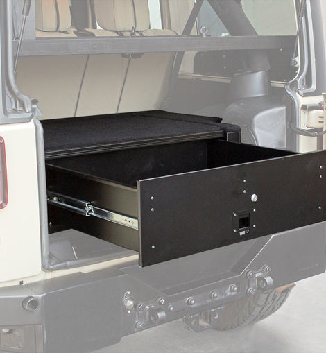 Make storing and organizing gear and valuables a no-brainer. This lockable drawer has been designed specifically for the Jeep Wrangler (JKU) 4-Door. Hide contents from prying eyes while creating more usable and easily accessible storage space in your vehicle.Engineered tough for both on and off-road travel.