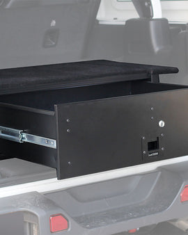 Make storing and organizing gear and valuables a no-brainer. This lockable drawer, with fitted deck and faceplates, has been designed specifically for the Jeep Wrangler JLU. Hide contents from prying eyes while creating more usable, and easily accessible, storage space in your vehicle.Engineered tough for both on and off-road travel.